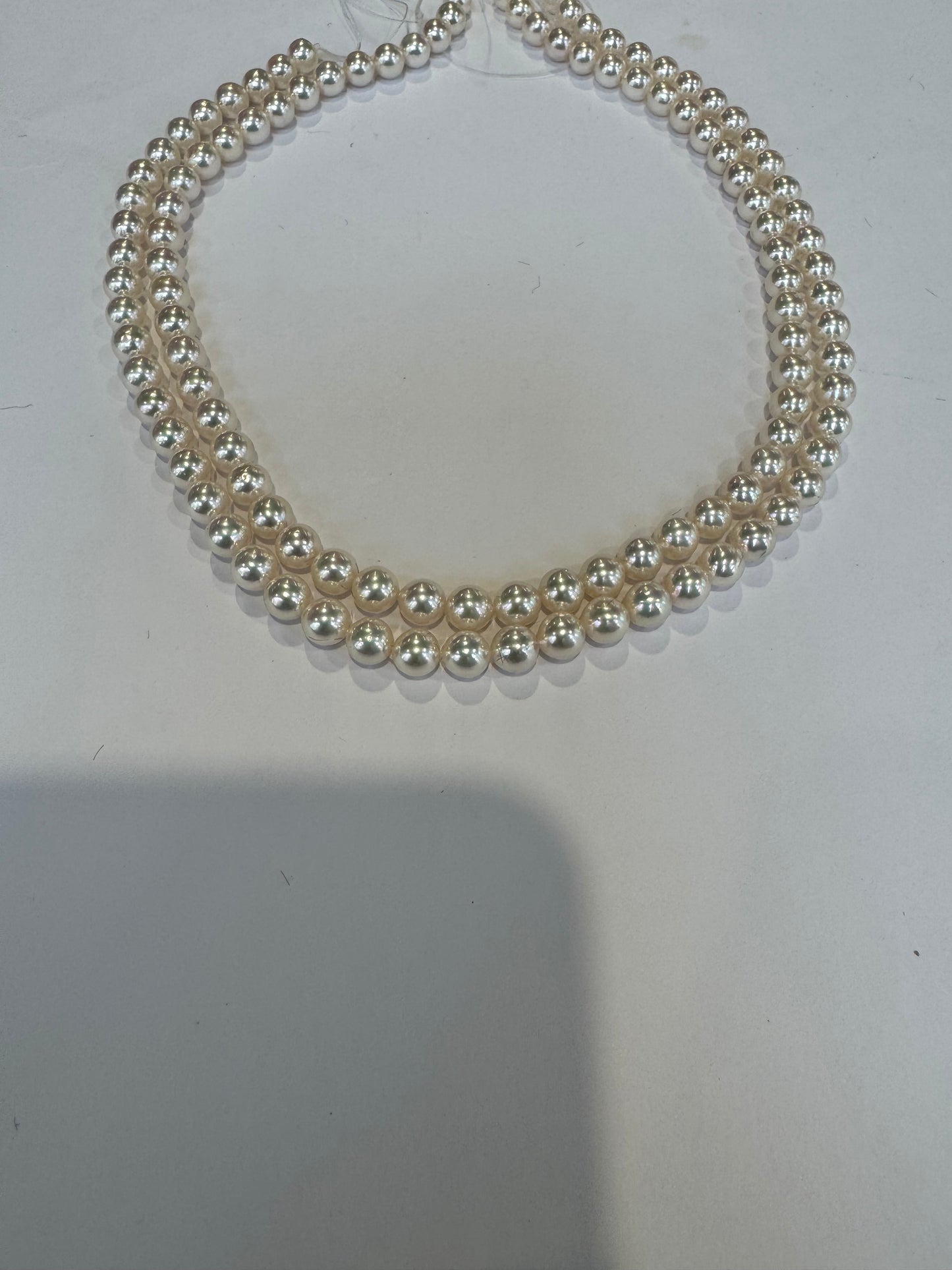 double strand 6 x 6 1/2 mm culture to call Pearls 14 karat gold clasp very high luster