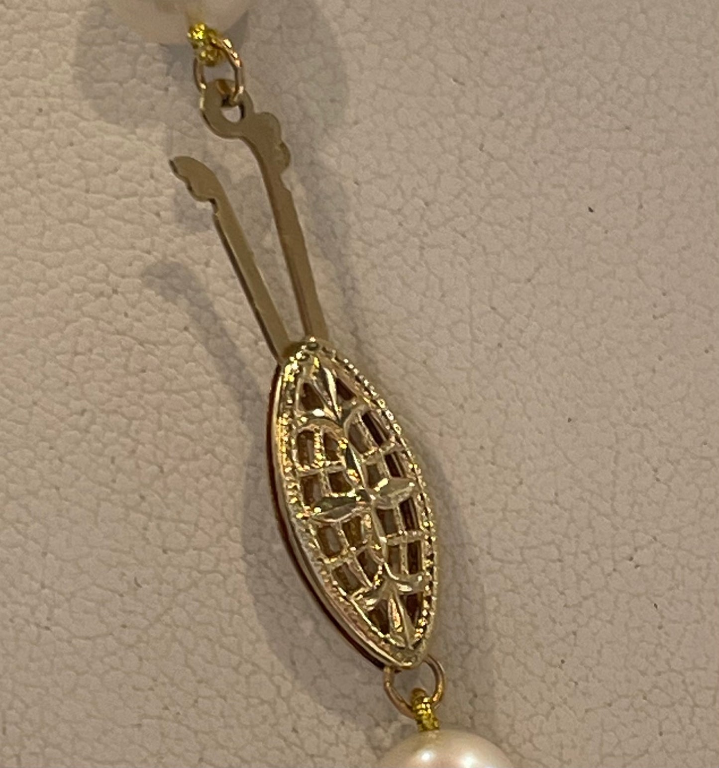 Cultured Pearls 7.5mm. 17 inches with a Gold Ball Clasp