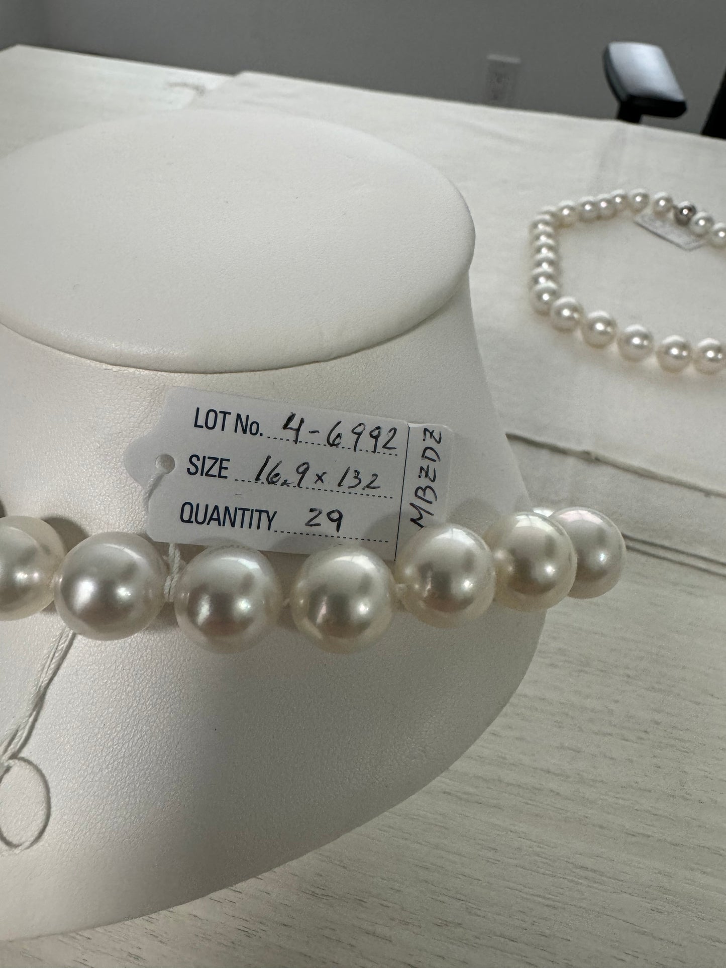 South seat Pearl necklace 14.1 x 16.1 mm lounge, clean, beautiful luster great matches with a 14 karat gold clasp