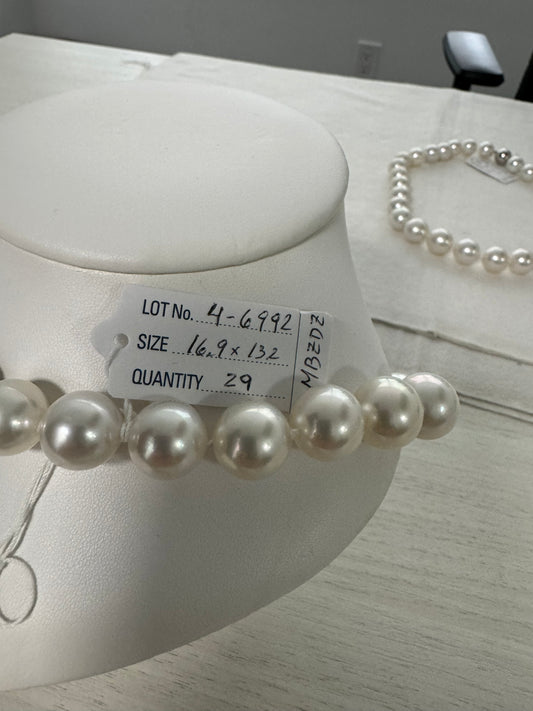 South seat Pearl necklace 14.1 x 16.1 mm lounge, clean, beautiful luster great matches with a 14 karat gold clasp