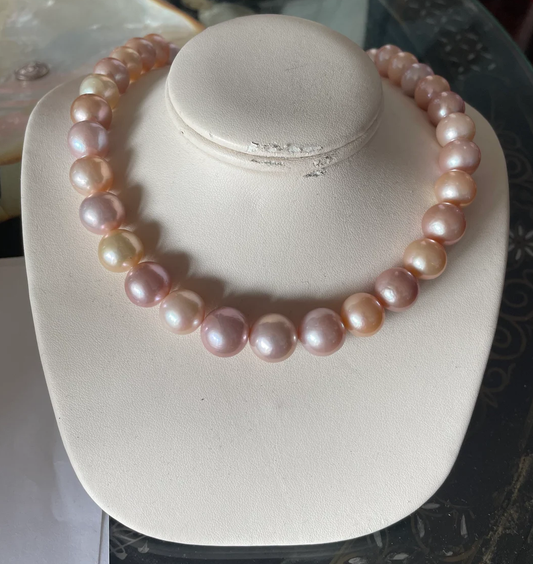 Strand of multicolored freshwater pearls. 14k