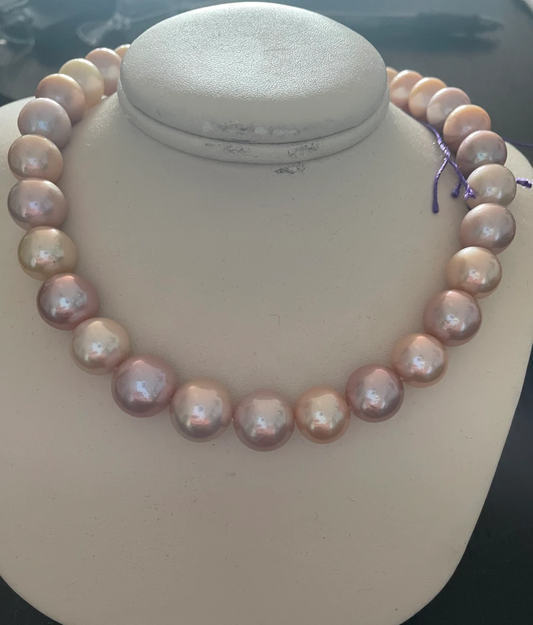 Strand of multicolored freshwater pearls. 14k