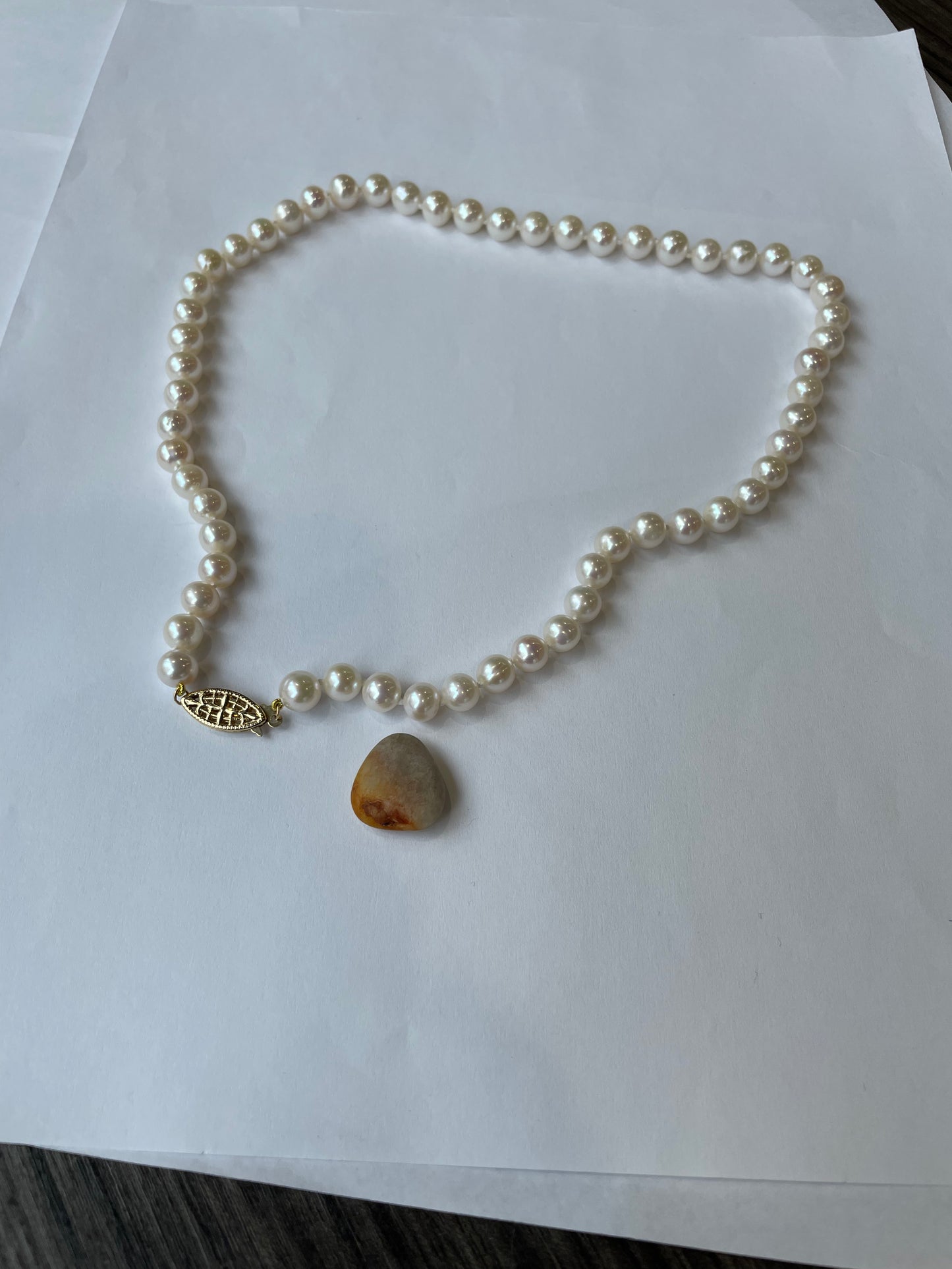 Cultured Pearls 7.5mm. 17 inches with a Gold Ball Clasp