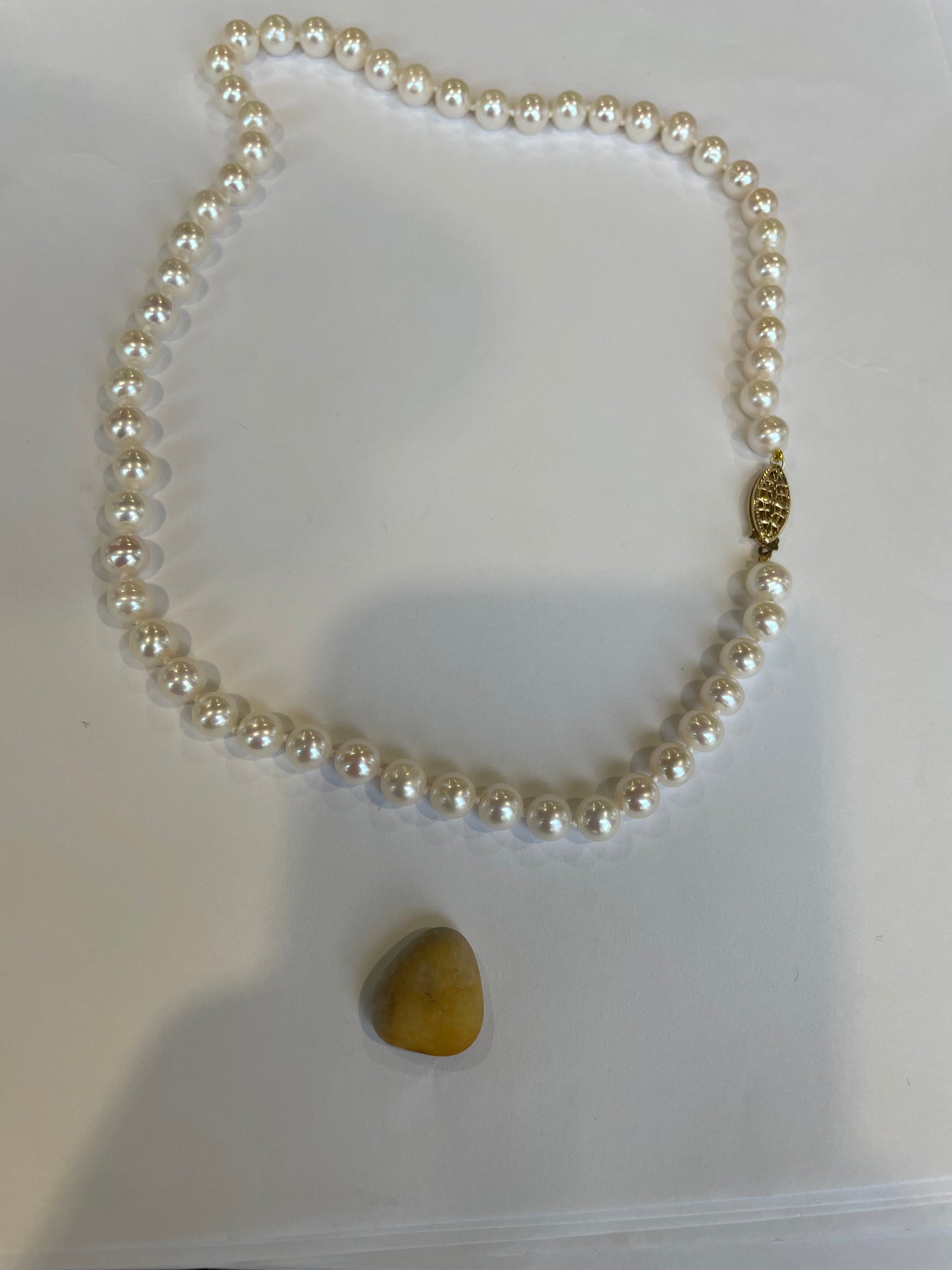 Cultured Pearls 7.5mm. 17 inches with a Gold Ball Clasp